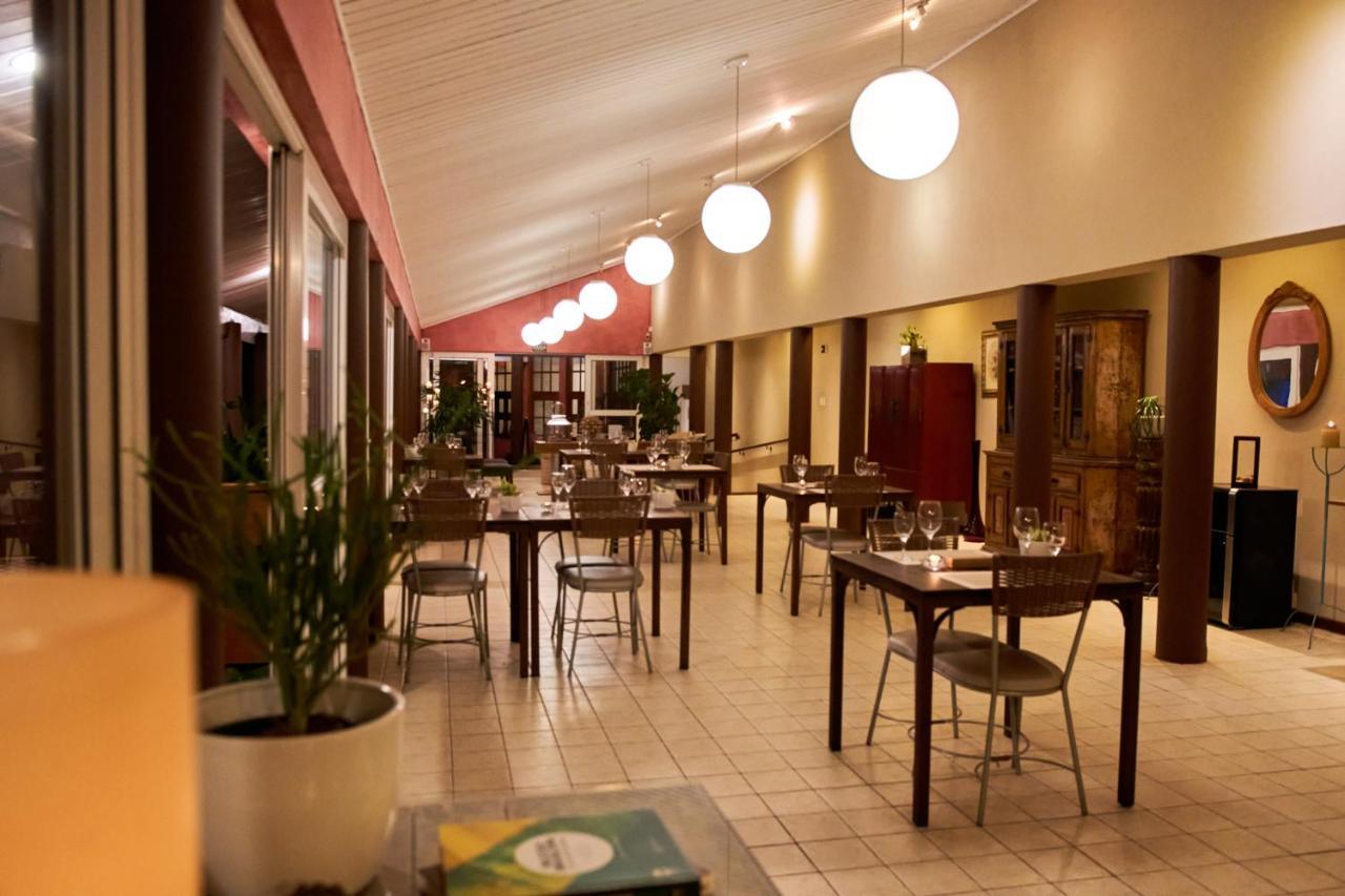 Hotel Boutique Frangipani Brotas Extérieur photo Restaurant