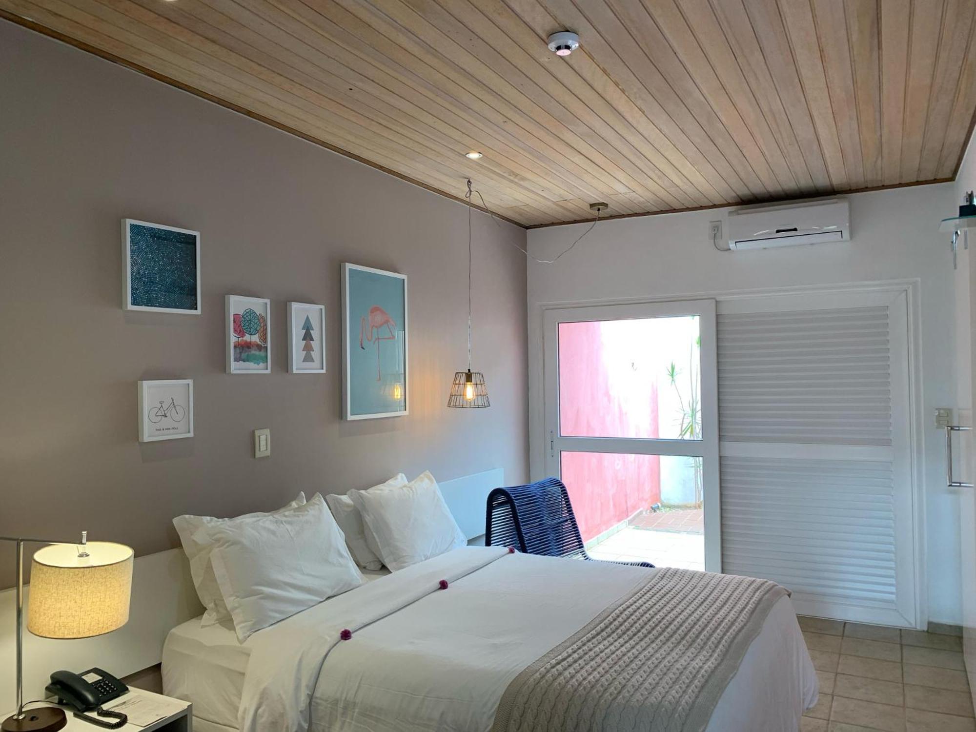 Hotel Boutique Frangipani Brotas Extérieur photo A room at the hotel