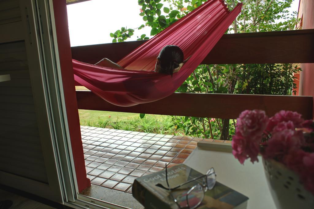 Hotel Boutique Frangipani Brotas Extérieur photo A hammock on a balcony
